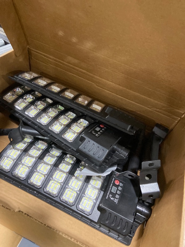 Photo 1 of JAYNLT Solar Street Light, 7000K Dusk to Dawn Solar Security Floodlight with Motion Sensor, No Wiring Required, Easy to Install, Suitable for Outdoor Lighting in Parking Lots, Yards, Farms - 4 Pack