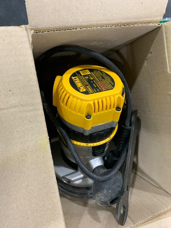 Photo 1 of DEWALT Router, Fixed Base, 12-Amp, 24,000 RPM Variable Speed Trigger, 2-1/4HP, Corded (DW618)