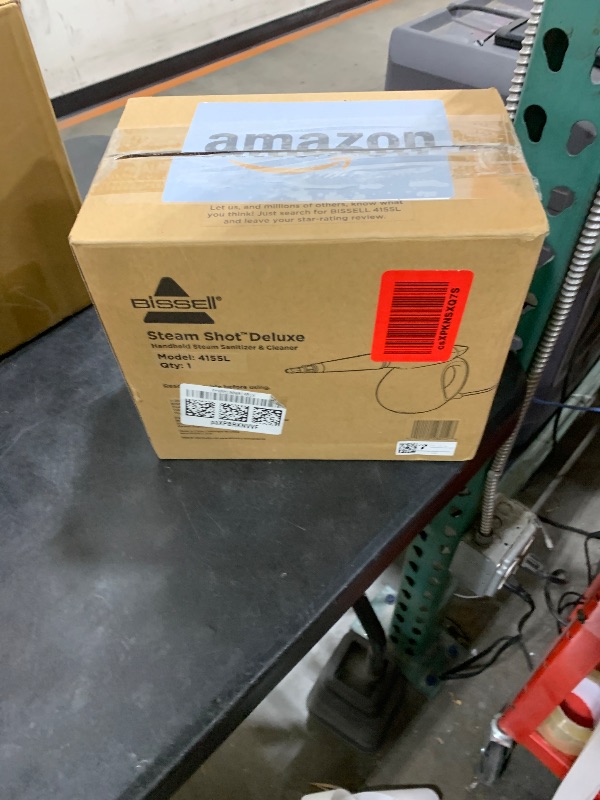 Photo 1 of BISSELL Steam Shot Deluxe handheld pressurized steamer for maintenance cleaning with 10 cleaning tools