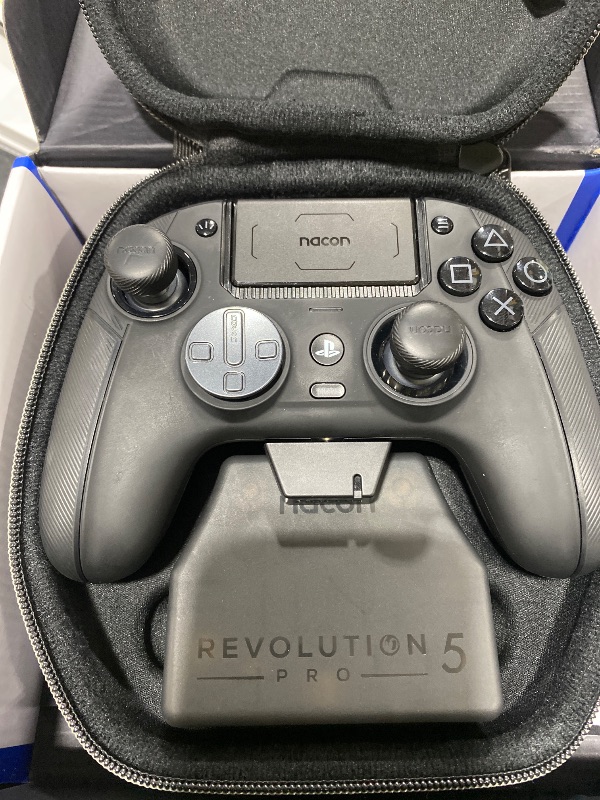 Photo 1 of NACON Revolution 5 Pro Officially Licensed PlayStation Wireless Gaming Controller for PS5 / PS4 / PC - Hall Effect, Trigger Stops, Mappable Buttons, Bluetooth Audio - Triple Black