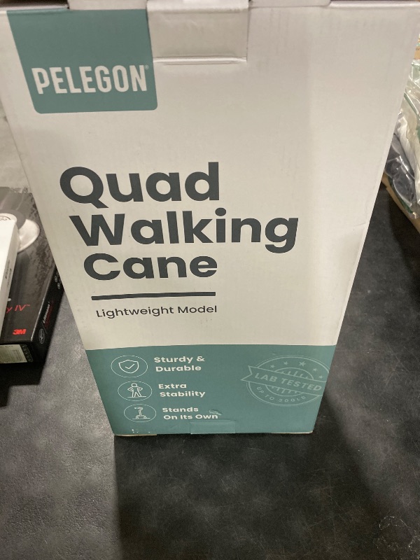 Photo 1 of PELEGON Quad Cane (300 lb) - Adjustable Walking Cane with A Large 4 Pronged Base for Extra Balance & Stability, Walking Canes for Seniors, Walking Cane for Men & Women, Walking Sticks (Black)