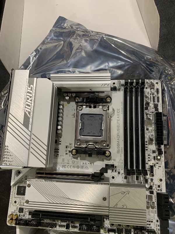 Photo 1 of GIGABTE B650M AORUS Elite AX ICE AMD AM5 mATX Motherboard, Support Ryzen 9000/8000/7000 Series, DDR5, 12+2+2 Power Phase, PCIe 5.0 M.2, USB-C 3.2 Gen 2, WIFI6E, 2.5 GbE, EZ-Latch, Q-Flash, RGB Fusion
