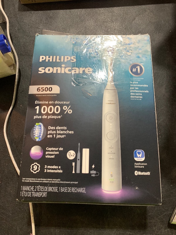 Photo 1 of **INCOMPLETE* SEE NOTES** Philips Sonicare 6500 Series Electric Toothbrush - Next-Generation Sonicare Technology, Pressure Sensor, 9 Brushing Settings, SmarTimer, BrushPacer, 21-Day Runtime, Travel Case, White, HX7410/10
