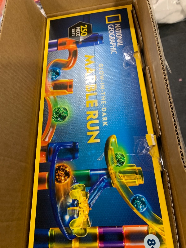 Photo 1 of NATIONAL GEOGRAPHIC Glowing Marble Run – 250 Piece Construction Set with 50 Glow in The Dark Glass Marbles & Storage Bag, STEM Gifts for Boys and Girls, Building Project Toy (Amazon Exclusive)