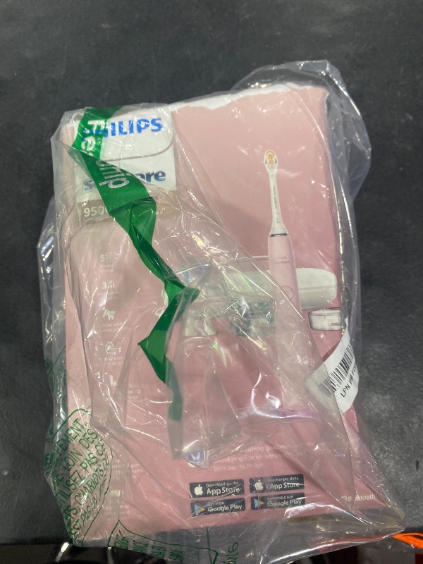 Photo 1 of Philips Sonicare DiamondClean Smart 9500 Electric Toothbrush, Sonic Toothbrush with App, Pressure Sensor, Brush Head Detection, 5 Brushing Modes and 3 Intensity Levels, Pink, Model HX9923/21