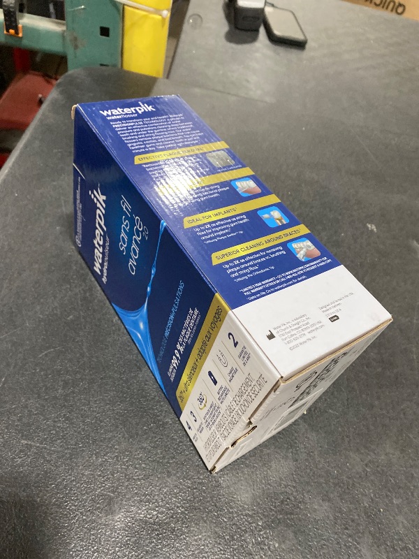 Photo 1 of Waterpik Cordless Advanced 2.0 Water Flosser For Teeth, Gums, Braces, Dental Care With Travel Bag and 4 Tips, ADA Accepted, Rechargeable, Portable, and Waterproof, Gray WP-587, Packaging May Vary