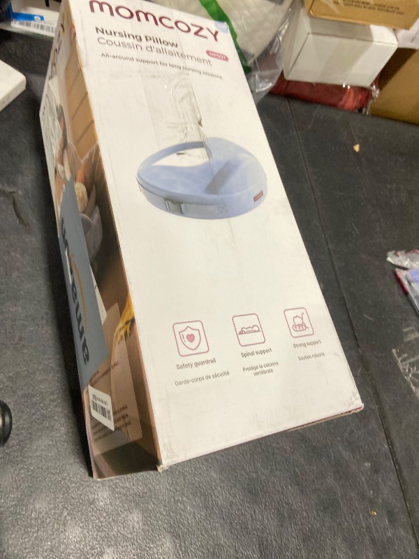 Photo 1 of Momcozy Innovative Safety Guard Nursing Pillow - Firm & Springy Memory Foam - Stable, Ergonomic Support & Comfort - Wider Breastfeeding Cushion, Adjustable, Removable Cover, Baby Safety Certified