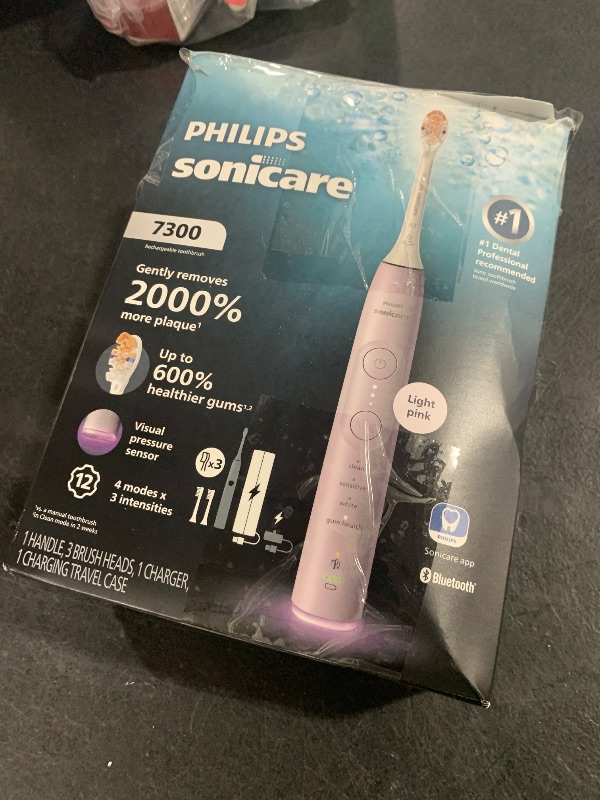 Photo 1 of Philips Sonicare 7300 Series Electric Toothbrush - Next-Generation Sonicare Technology, Pressure Sensor, 12 Brushing Settings, SmarTimer, 21-Day Runtime, Travel Case, Light Pink, HX7422/04