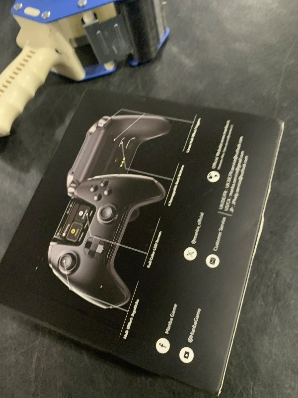 Photo 1 of ManbaOne Interactive Screen Wireless Gaming Controller for PC/Switch/Switch 2/iOS/Android,Hall Effect Stick & Trigger,RGB Lighting,Remappable Buttons,1800mAh with Charging Dock (Black)