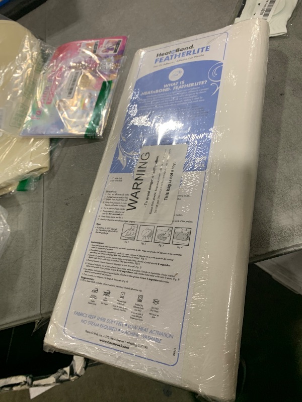 Photo 1 of HeatnBond FeatherLite Iron-On Adhesive, 17 Inches x 35 Yards,White