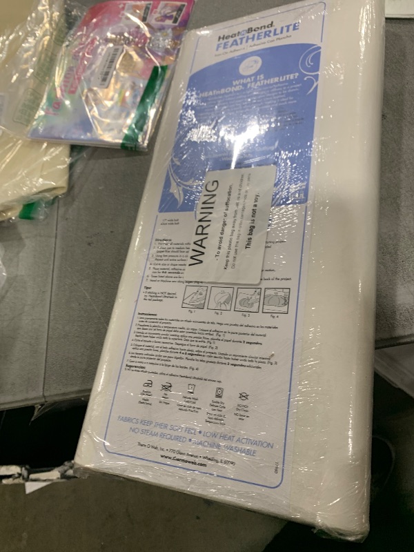 Photo 1 of HeatnBond FeatherLite Iron-On Adhesive, 17 Inches x 35 Yards,White