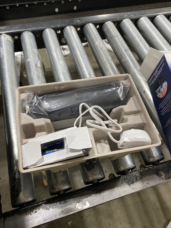 Photo 1 of Oral-B iO Simple Clean Rechargeable Electric Powered Toothbrush, Night Black with 1 Gentle Care Brush Head and 1 Black Travel Case - Automatic Pressure Sensor to Protect Gums - 3 Modes - 2 Min Timer