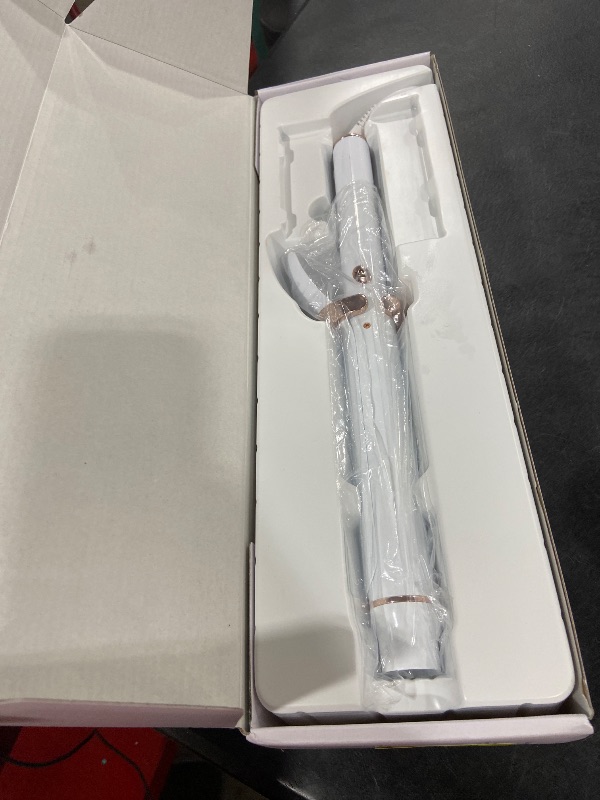 Photo 1 of T3 SinglePass Curl X Extra-Long Barrel Curling Iron with 9 Heat Settings and Ceramic Barrel for Fast Styling and Lasting Results on All Hair Types