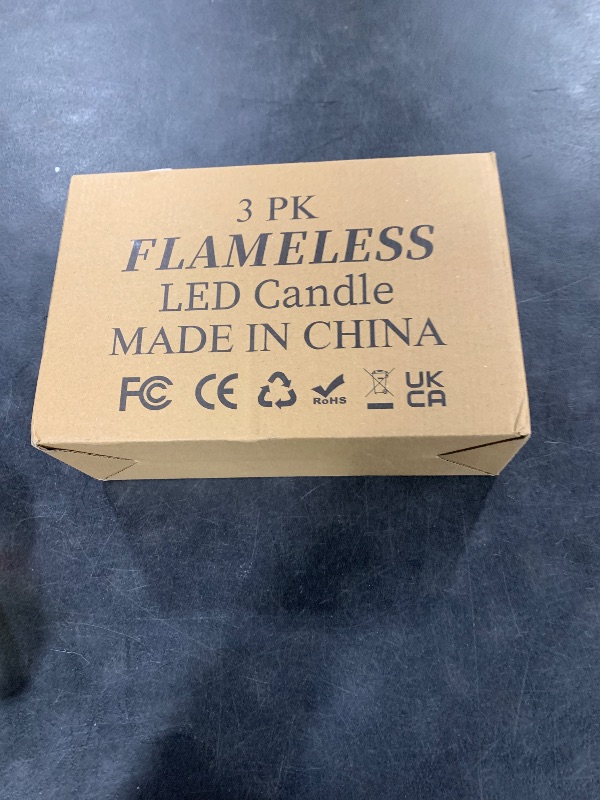 Photo 1 of Homemory Flickering Flameless Candles, Realistic LED Candles with Remote and Timer, Textured Wax with Water Ripple, Battery Operated Wax Candles, Set of 3, Ivory