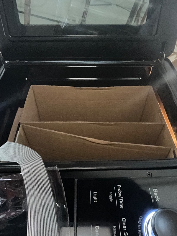 Photo 1 of **BRAND NEW ITEM***GE Profile™ Smart Indoor Pellet Smoker, with Active Smoke Filtration, 5 Smoke Control Settings, WiFi Connected, Electric, Countertop BBQ Appliance, Black