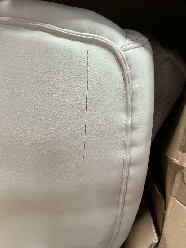 Photo 1 of **ITEM DAMAGE HAS A MINOR RIPS***Amazon Basics Ergonomic Executive Office Desk Chair with Lumbar Support, Flip-up Armrests, Adjustable Height, Cream Leather