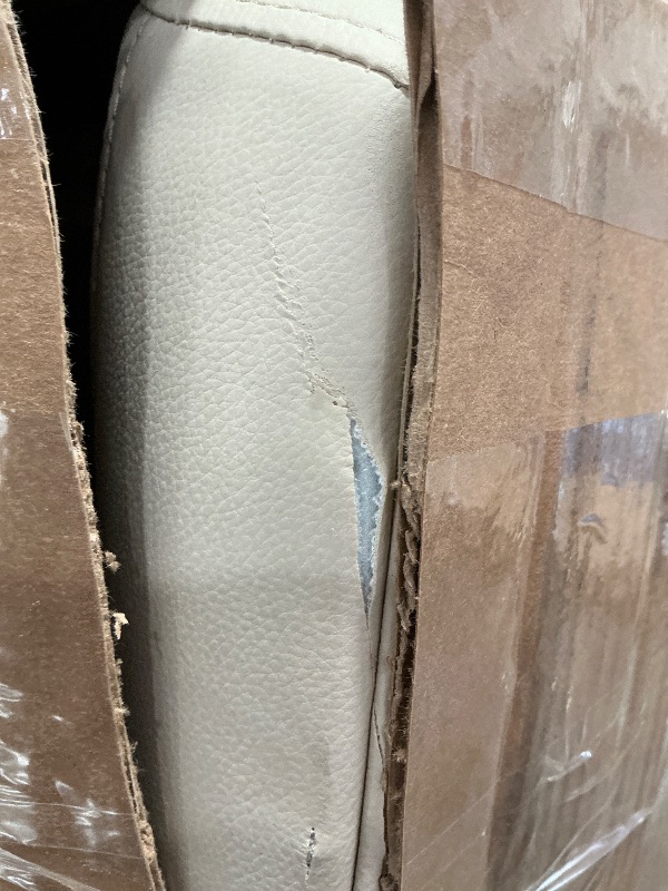 Photo 1 of **ITEM DAMAGE HAS A MINOR RIPS***Amazon Basics Ergonomic Executive Office Desk Chair with Lumbar Support, Flip-up Armrests, Adjustable Height, Cream Leather