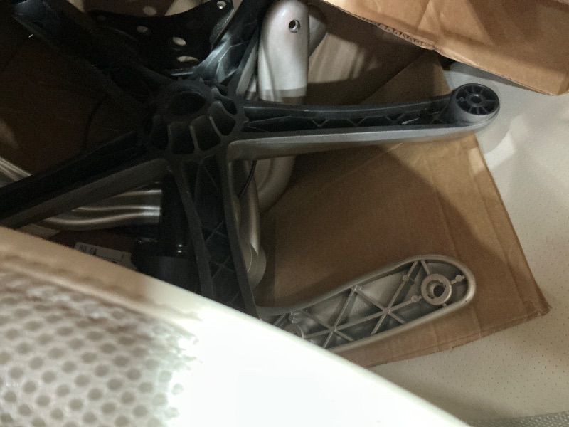 Photo 1 of **ITEM DAMAGE HAS A MINOR RIPS***Amazon Basics Ergonomic Executive Office Desk Chair with Lumbar Support, Flip-up Armrests, Adjustable Height, Cream Leather