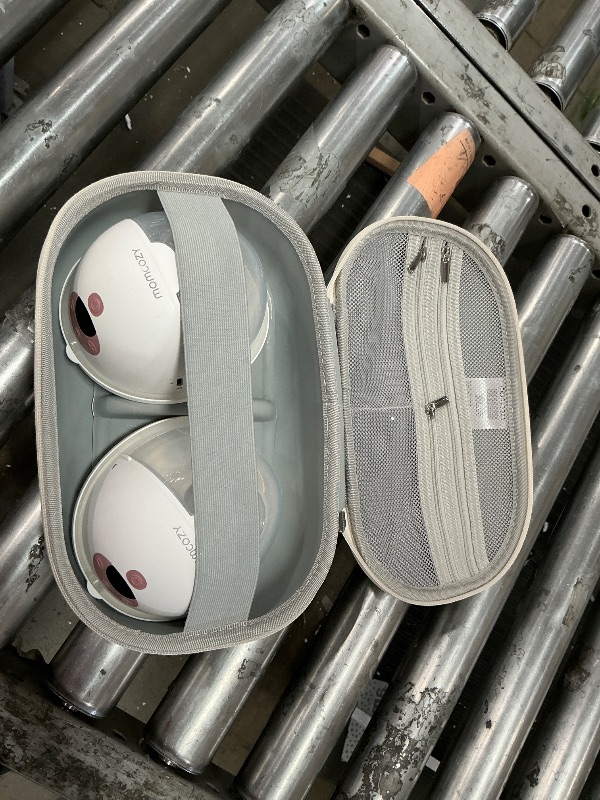 Photo 1 of  **USED HAS MILK / BLACK***

Momcozy M5 Hands-Free Wearable Breast Pump, Double-Sealed Flange for Baby-Like Comfort, 3 Modes & 9 Suction Levels, Portable Electric Pump – 24mm, 2-Pack Cozy Red