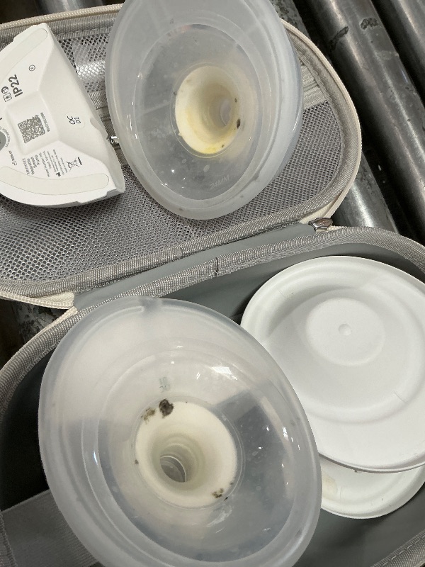 Photo 1 of  **USED HAS MILK / BLACK***

Momcozy M5 Hands-Free Wearable Breast Pump, Double-Sealed Flange for Baby-Like Comfort, 3 Modes & 9 Suction Levels, Portable Electric Pump – 24mm, 2-Pack Cozy Red