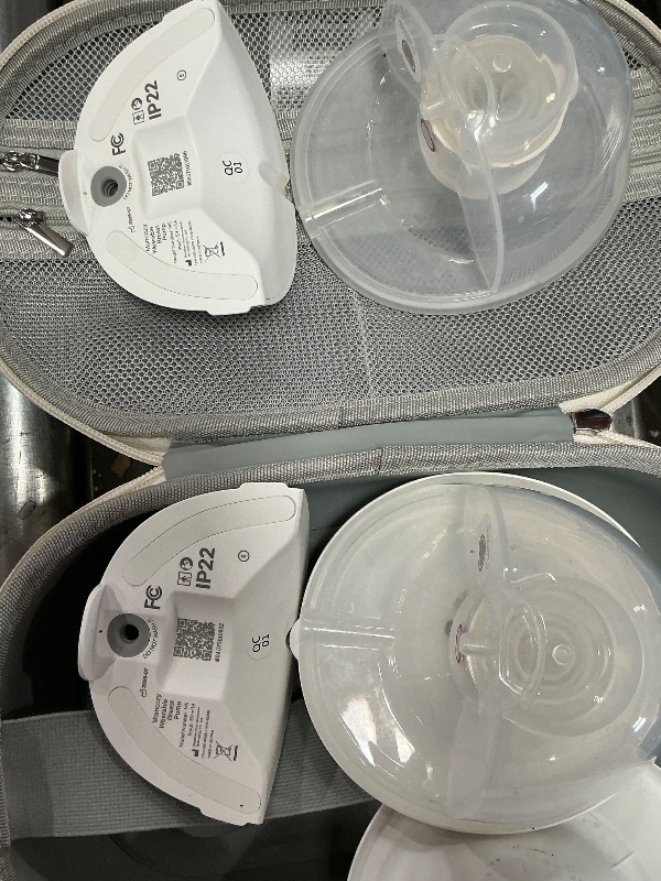 Photo 1 of  **USED HAS MILK / BLACK***

Momcozy M5 Hands-Free Wearable Breast Pump, Double-Sealed Flange for Baby-Like Comfort, 3 Modes & 9 Suction Levels, Portable Electric Pump – 24mm, 2-Pack Cozy Red