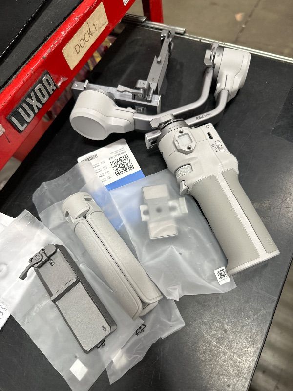 Photo 1 of (used/missing items**) DJI RS 4 Mini Combo, Gimbal Stabilizer for Cameras Canon/Sony/Panasonic/Nikon/Fujifilm, Auto Axis Locks, Intelligent Tracking, 2kg/4.4lbs Payload, Camera Gimbal, Camera Stabilizer, Briefcase Handle