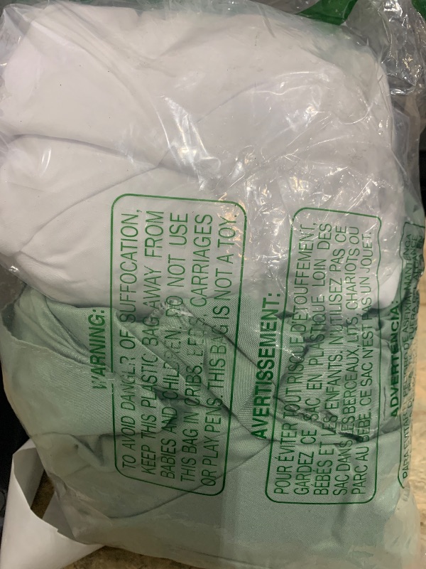 Photo 1 of 1 green bottom bed dressing w/ white regular sheet