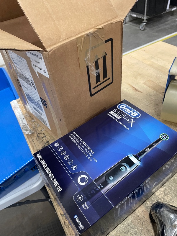 Photo 1 of **ITEM FACTORY SEALED** Oral-B Genius X Limited Rechargeable Electric Toothbrush with 1 Replacement Brush Head, Travel Case, Midnight Black