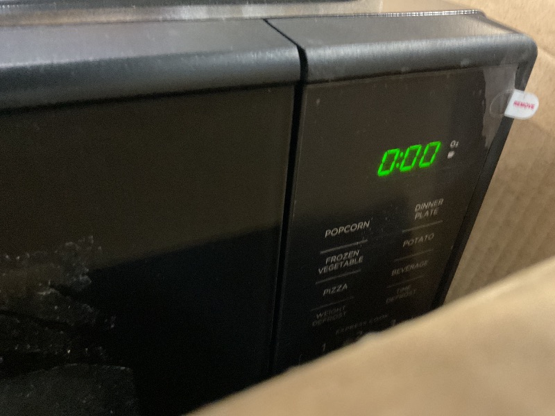Photo 1 of ***TESTED FOR POWER ONLY***Mainstays 1.1 Cu Ft Microwave Oven in Black