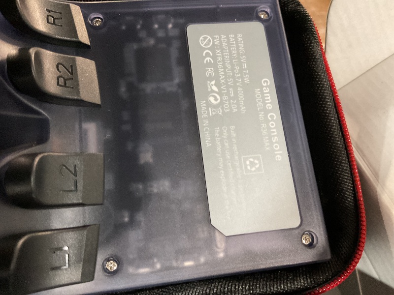 Photo 1 of ?R36MAX 4000mAh Portable Rechargeable Handheld Retro Game Console,Comfort Non-Slip Handheld Standing Retro Game Console with 64G TF Car,4.0-inch Screen,for Office,Purple Gray