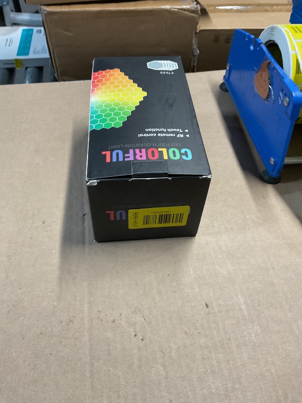 Photo 1 of ***Missing power chord and remote*** 6 Pack Hexagon Light Panels - Smart RGB Hexagon LED Lights Wall Lights Remote Control Lights for Lving Room, Bedrooms, DIY Lovers, Gifts, Gaming Room, Kids