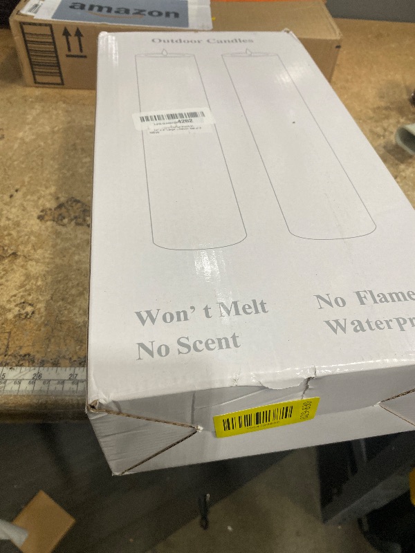 Photo 1 of ***(PARTS ONLY/ MINOR DAMAGE/ MISSING REMOTE)***14" x 4" Large Flameless Candles with Remote & Timer, Waterproof Outdoor Battery Operated Candles LED Electric Flickering Flameless Pillar Candle for Patio Porch Lanterns Home Decor, Set of 2