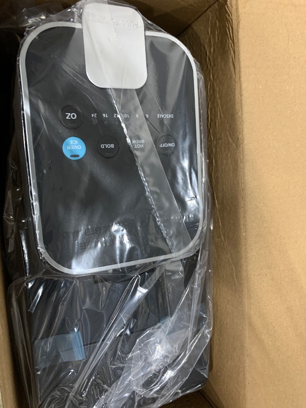 Photo 1 of **FACTORY SEALED** Tastyle Single Serve Coffee Maker, Iced and Hot Coffee Machine for K Cup & Grounds, Compact Design, 40oz Removable Water Reservoir, 6 to 24 Oz Brew Sizes, Fits 7.3" Travel Mug, Black