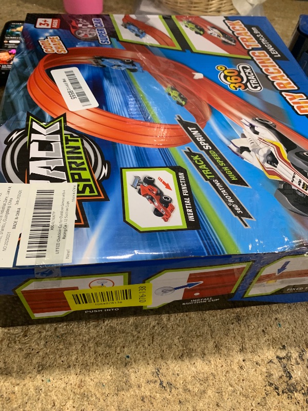Photo 1 of ***(MISSING PARTS)***LITTCO Flexible Race Track, Car Ramp Toy, 12.8 Ft Flexible Car Ramp System with 4 F1 Racing Cars, Ready-to-Play Indoor/Outdoor Racing Kit, Ultimate Birthday, for Kids Ages 6+