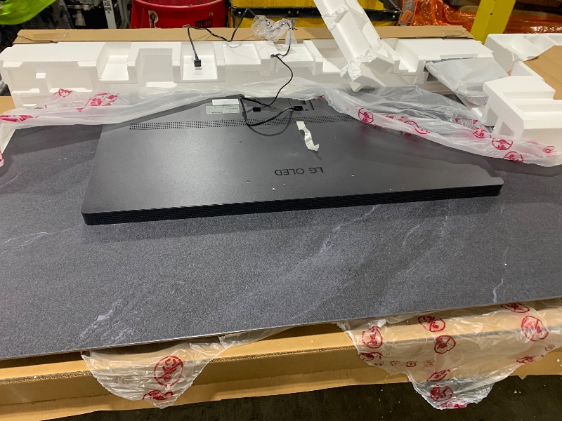 Photo 1 of Missing remote control and hardware-------------------------------------------------------------------------------------LG 77-Inch Class OLED evo AI 4K C5 Series Smart TV w/Dolby Atmos, Dolby Vision, HDR10, AI Super Upscaling 4K, Filmmaker Mode, Wow Orche