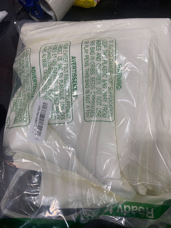 Photo 2 of Biscaynebay Textured Fabric Tablecloths 90x156 Inches Rectangular, Ivory Water Resistant Tablecloths for Dining, Kitchen, Wedding, Parties etc. Machine Washable