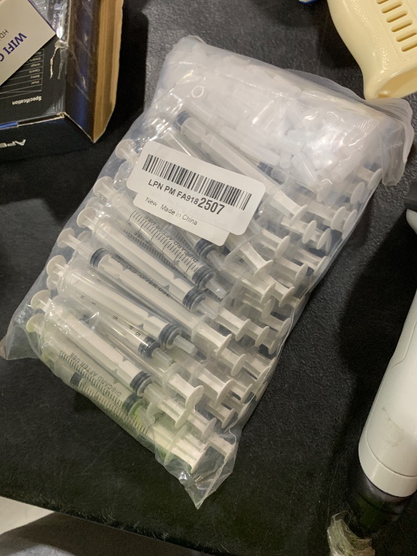 Photo 1 of 100 Pack 3mL Syringe with Tip Cap for Liquid, 3cc Plastic Syringes with Cover, Non-Sterile, No Needle