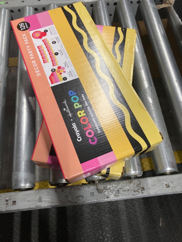 Photo 1 of   PACK OF 2Crayola Color Pop Party Decorations Set - Red, Orange, Pink, Yellow (Customizable Banner, Reversible Table Runner, Paper Fan Flowers, Paper Dots) for Birthdays, Holidays, Celebrations