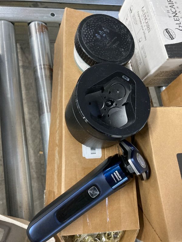 Photo 1 of **MISSING PARTS/NO POWER PLUG**Philips Norelco Shaver 7800, Rechargeable Wet & Dry Electric Shaver with SenseIQ Technology, Quick Clean Pod, Charging Stand, Travel Case and Pop-up Trimmer, S7885/85