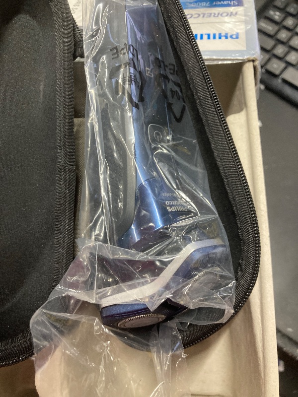 Photo 1 of **MISSING PARTS/NO POWER PLUG**Philips Norelco Shaver 7800, Rechargeable Wet & Dry Electric Shaver with SenseIQ Technology, Quick Clean Pod, Charging Stand, Travel Case and Pop-up Trimmer, S7885/85