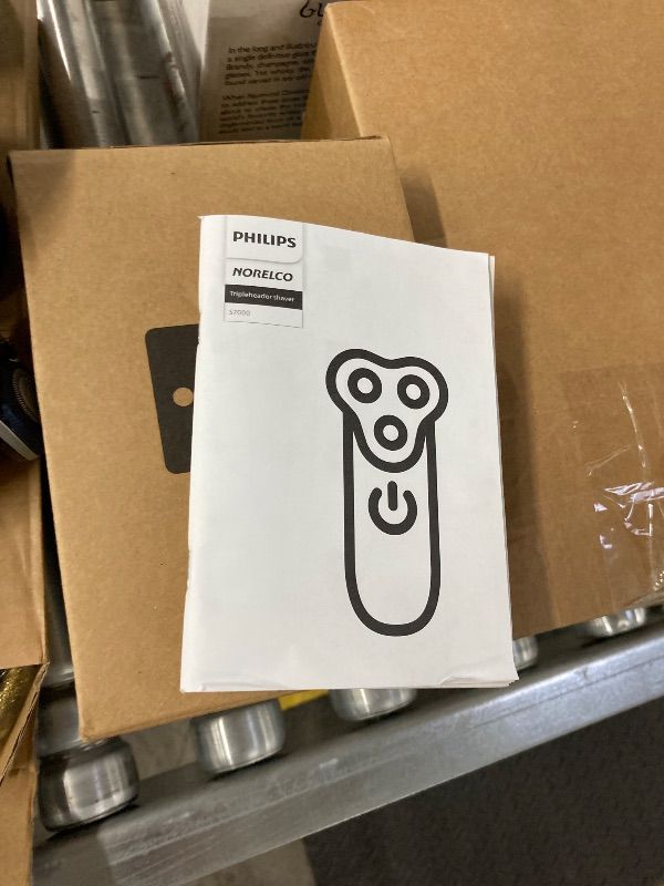 Photo 1 of **MISSING PARTS/NO POWER PLUG**Philips Norelco Shaver 7800, Rechargeable Wet & Dry Electric Shaver with SenseIQ Technology, Quick Clean Pod, Charging Stand, Travel Case and Pop-up Trimmer, S7885/85