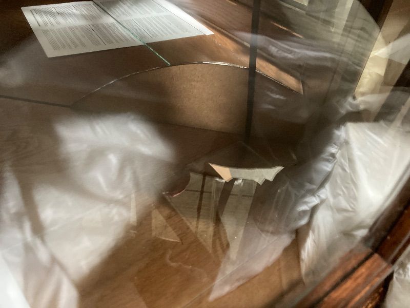 Photo 1 of **MISSING ONE BOTTOM GLASS ON SIDE DOOR/NO SHELVES/BASE HAS MINOR SEPERATION-SEE PICS***Howard Miller Jamestown II Corner Curio Cabinet 680-250 – Oak Yorkshire Finish Home Decor, Seven Glass Shelves, Eight Level Display Case, Locking Front Door & Halogen 