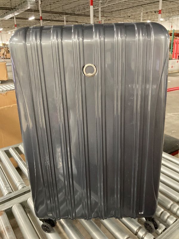 Photo 1 of **HAS DENT ON BOTTOM**DELSEY Paris Aero Expandable Hardside Large Checked Spinner Upright Suitcase - Platinum