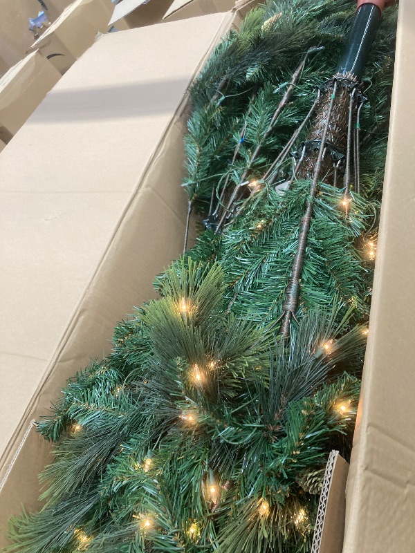 Photo 1 of *HEAVY* National Tree Company 9 ft Pre-Lit Carolina Pine Full Artificial Christmas Tree, 900 Clear Lights, 2,347 Tips, Includes Stand, Green