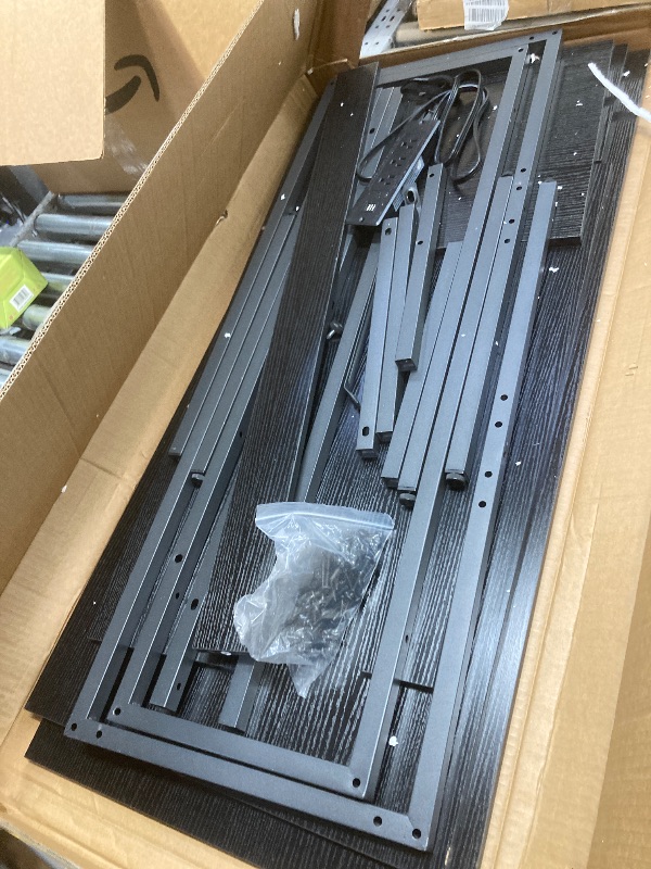 Photo 1 of *Chipped* Unikito Reversible L Shaped Desk with Magic Power Outlets and USB Charging Ports, Sturdy Corner Computer Desk with Storage Shelves, Gaming Table Home Office Desk, Easy to Assemble, Black