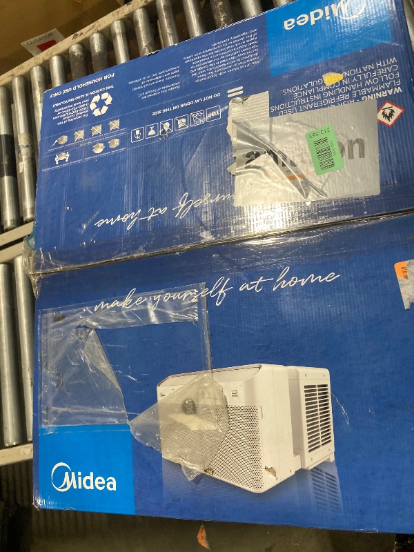 Photo 1 of ***VERY USED*** Midea 12,000 BTU U Shaped Smart Inverter Window Air Conditioner - Cools 550 Sq Ft, Ultra Quiet with Open Window Flexibility - Alexa/Google Assistant Compatible - 35% Energy Savings, Remote (Updated)