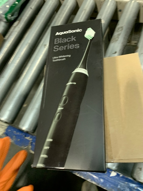 Photo 1 of ** VERY USED** Aquasonic Black Series Ultra Whitening Toothbrush – ADA Accepted Electric Toothbrush- 8 Brush Heads & Travel Case – 40,000 VPM Electric Motor & Wireless Charging - 4 Modes w Smart Timer