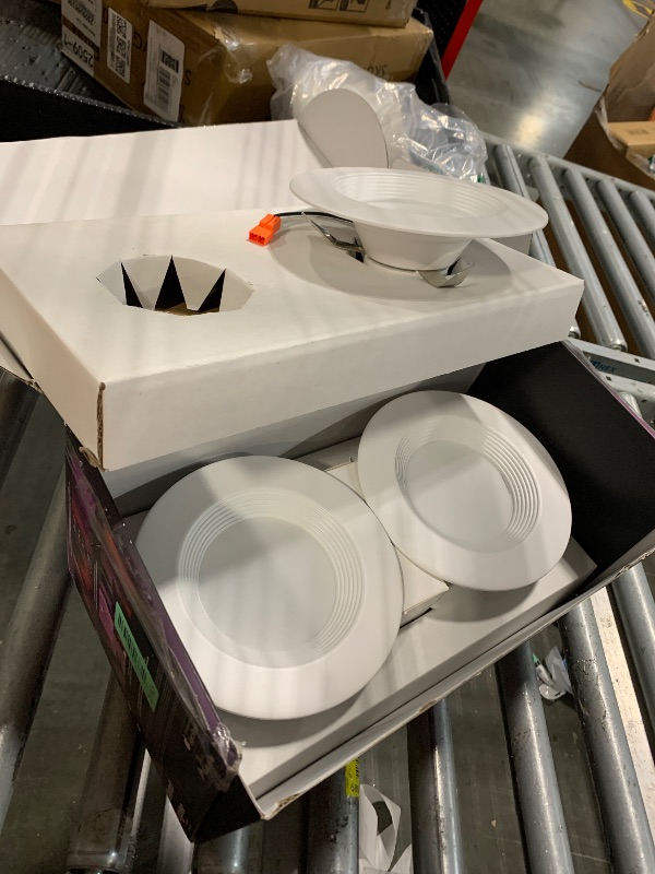 Photo 1 of ****MISSING ONE PIECE****
Philips Hue Smart Retrofit Recessed 5/6 Inch LED Downlight 4 Pack, White and Color Ambiance Color-Changing Light, 1100LM, Control with Hue App, Works with Alexa, Google Assistant and Apple HomeKit