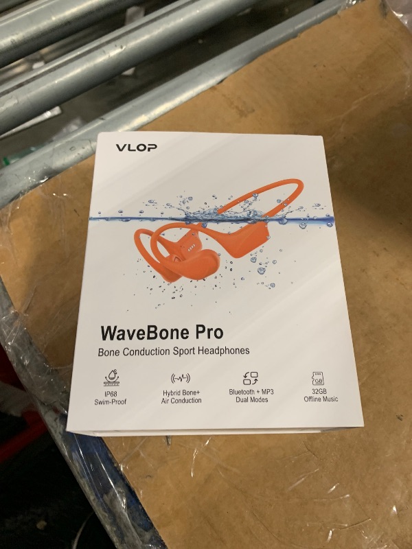 Photo 1 of **MISSING CHARGER**
VLOP Bone Conduction Swimming Headphones IP68 Waterproof, Open-Ear MP3 Headphones with 32GB Memory, Bluetooth 6.0 Wireless Sport Headset for Swimming, Running & Cycling, 8H Playtime(Orange, Standard)