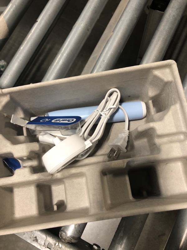 View 3 of ***MISSING ITEMS !!!HAS BEEN USEED****Oral-B Rechargeable Electric Toothbrush, iO3 Limited Deep Clean, 3 Cleaning Modes, Visual Pressure Sensor to Protect Gums, 2 Brush Heads, Travel Case, ICY Blue